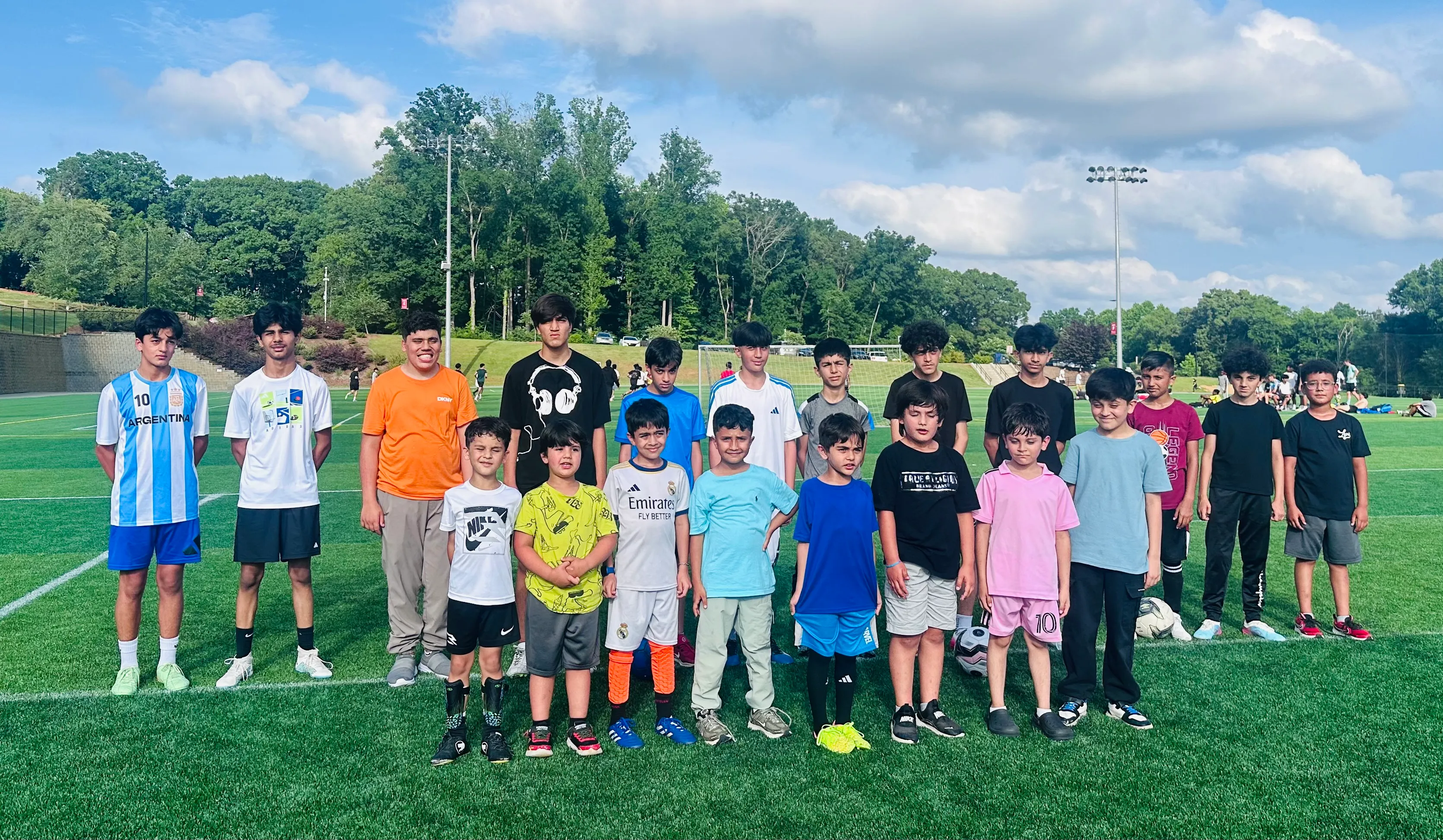 Young players lined up before a Maihan Association soccer match.